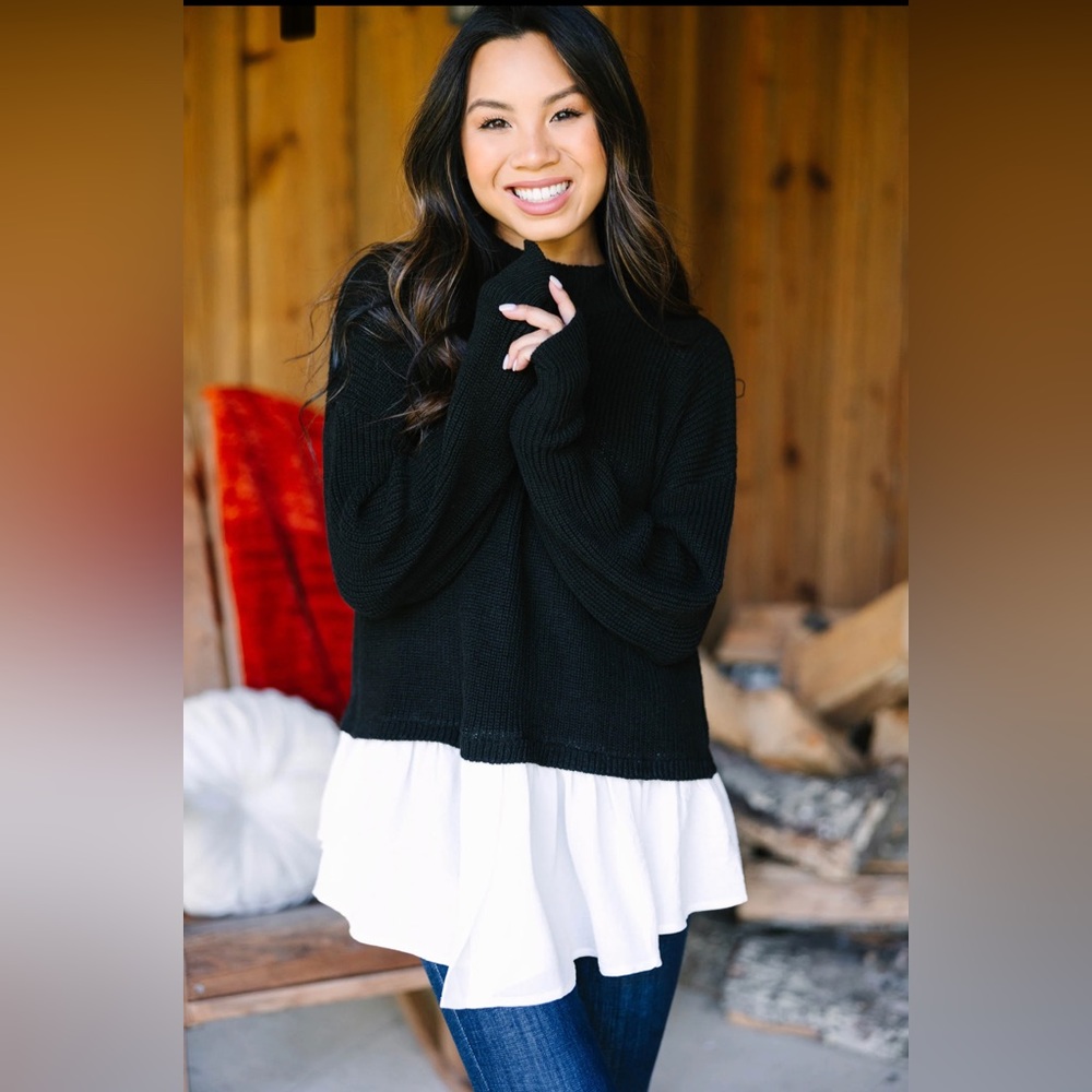 Shop the mint black and white sweater